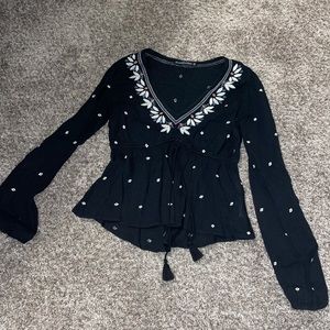 Long sleeve tassel top